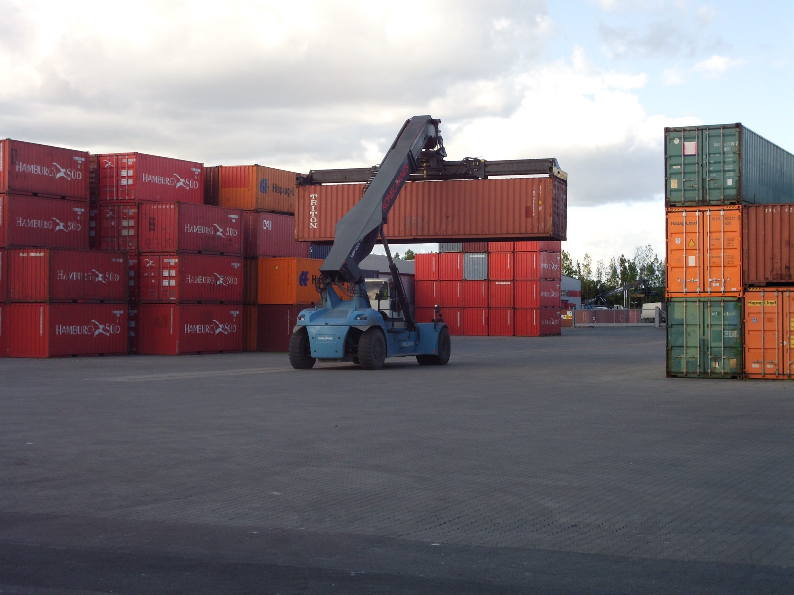 Container terminal with stacked containers and gantry cranes